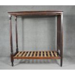 A Georgian mahogany full tester bedstead with turned supports, to take a small single mattress. H.