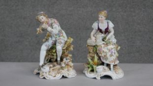 A pair of German fine porcelain hand painted figures. One of a shepherdess with a young sheep