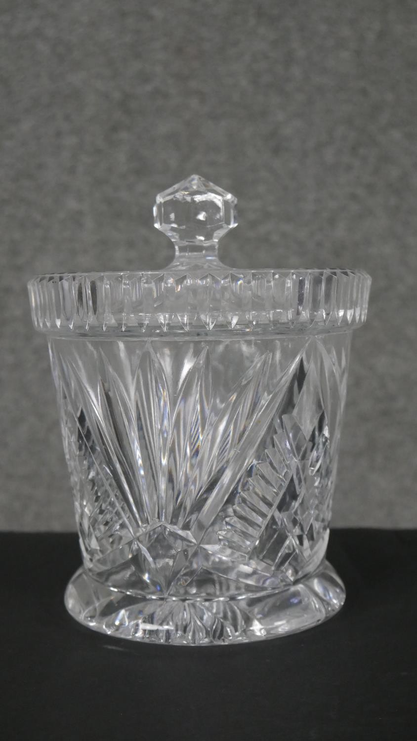 A collection of eight cut crystal pieces. Including a boat shaped crystal bowl, a lidded cut crystal - Image 3 of 6