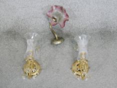 Three glass wall lights. Including a pair of brass and etched glass shade wall lights and a maroon