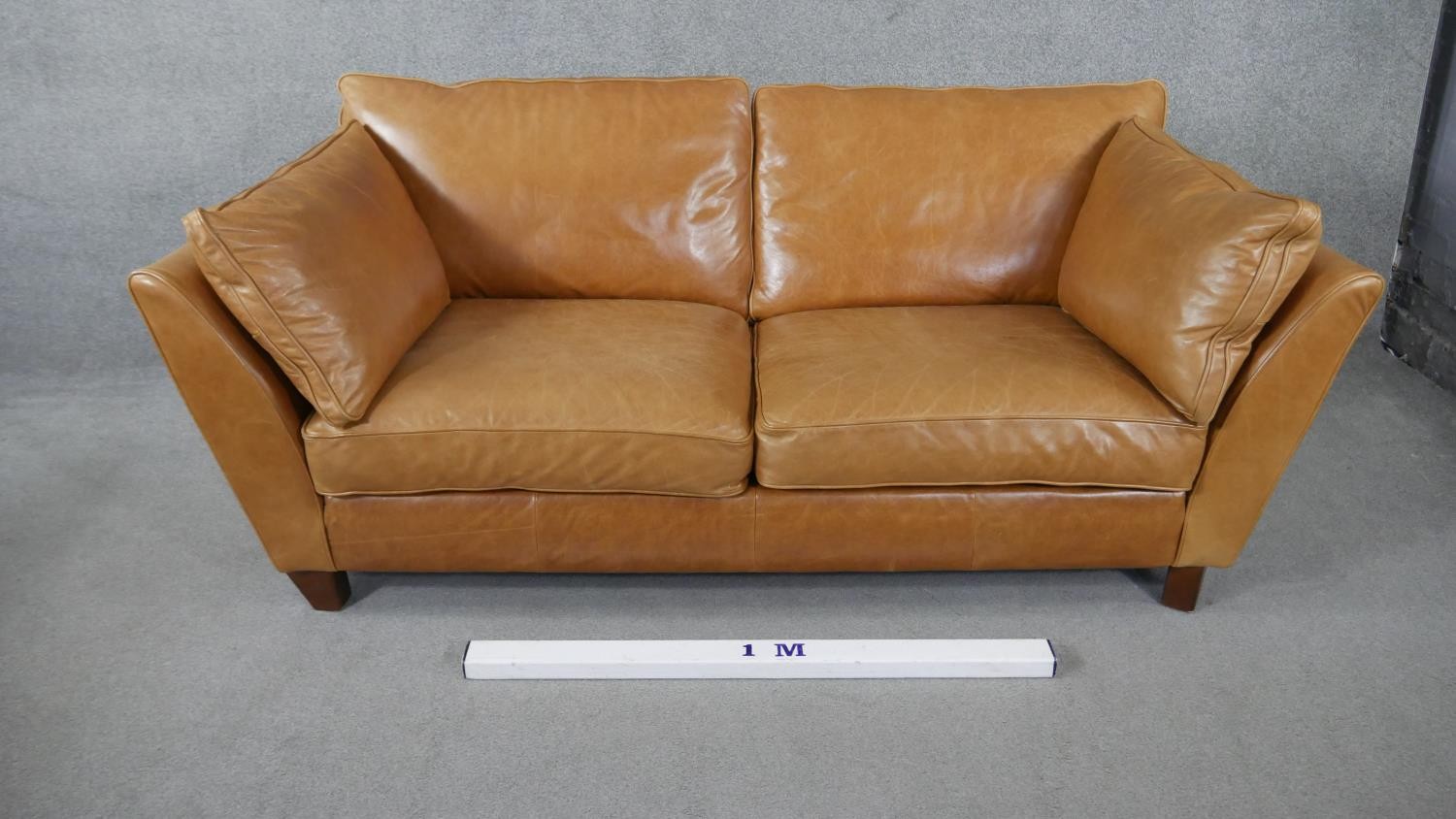 An Art Deco style two seater sofa in light tan leather upholstery. H.84 W.179 D.97cm - Image 5 of 5