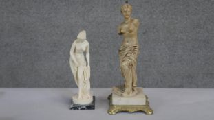 Two moulded marble effect female Classical figures. Both mounted on marble bases, one with a Greek