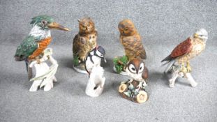 A collection of six hand painted ceramic bird figures. Including a Royal Crown Derby 'Brown Owl',