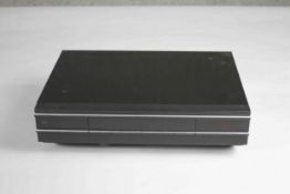 A Bang & Olufsen BeoCord V8000 hi-fi video recorder.