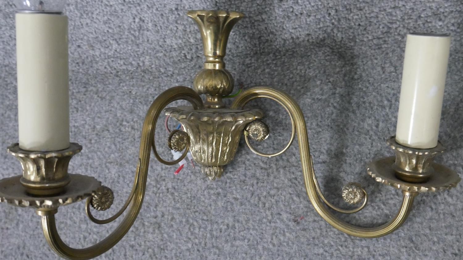 A pair of vintage brass acanthus and scrolling floral design two branch wall lights. H.30 W.34cm - Image 3 of 4