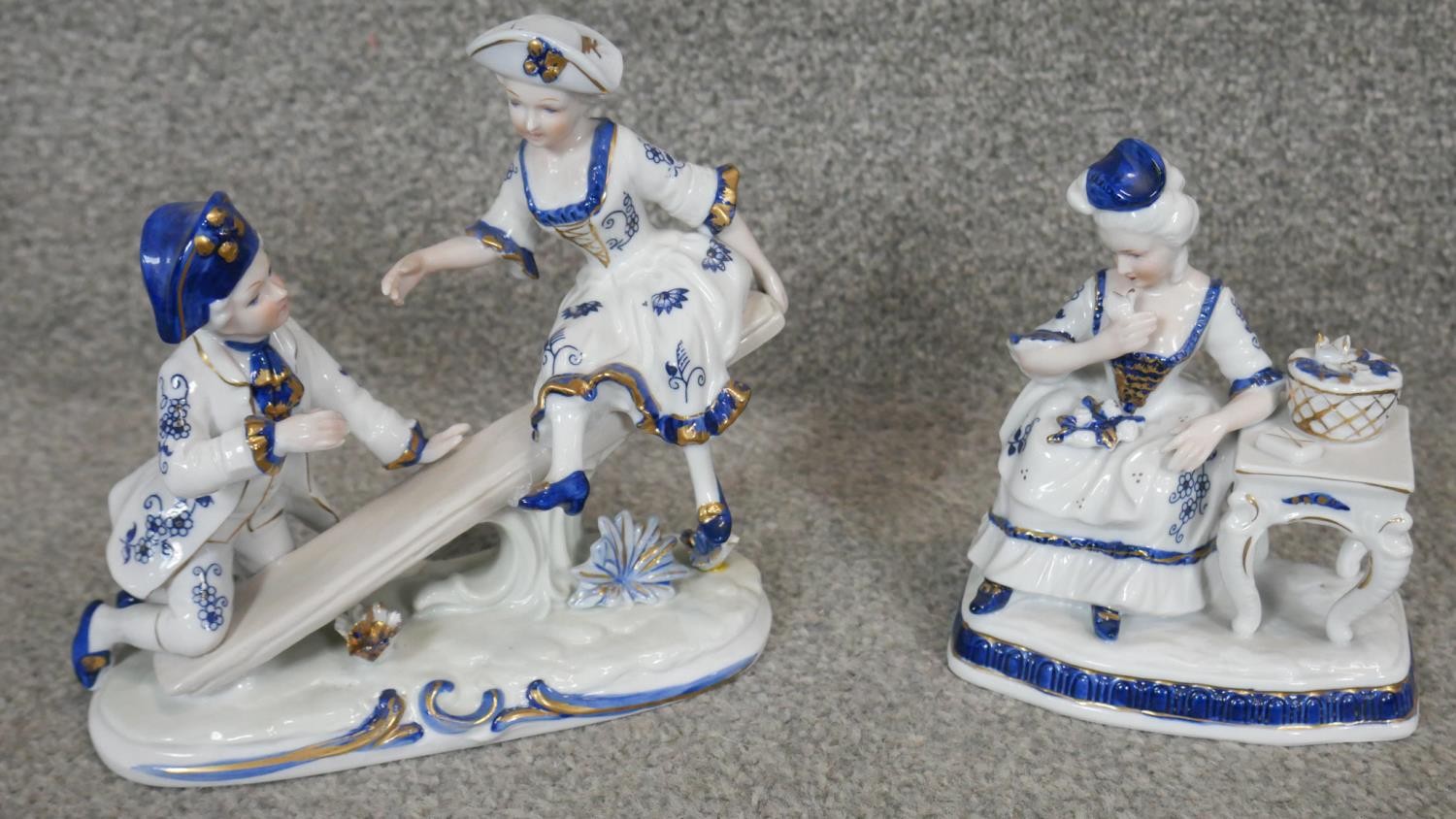 A collection of 12 blue and white gilded porcelain figures. Including a Coalport miniature cottage - Image 4 of 7