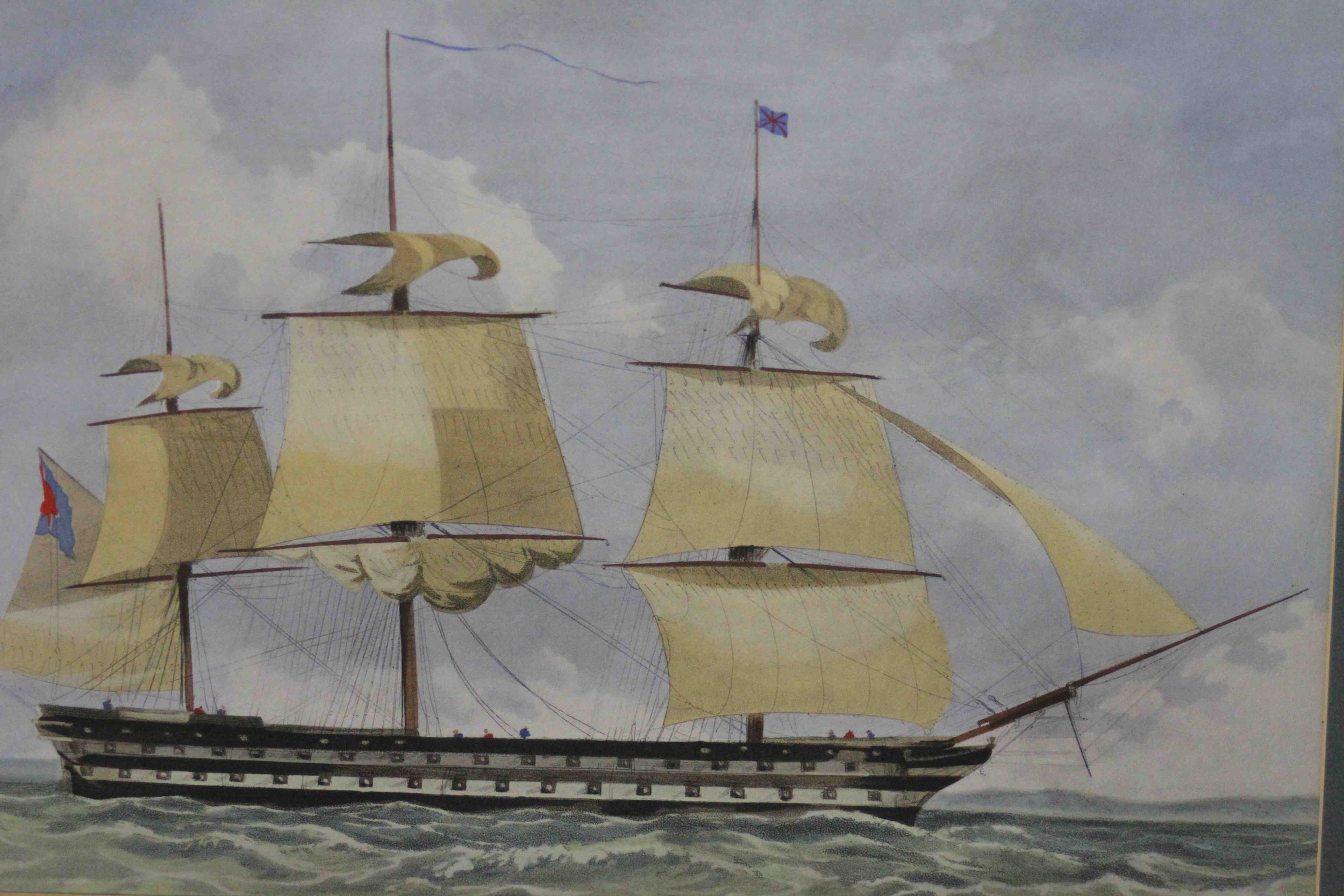 A framed and glazed 19th century hand coloured engraving of a British three mast schooner. Unsigned.