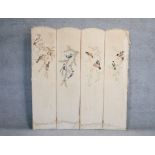 A hand embroidered fabric vintage four panel folding screen. Decorated with various species of