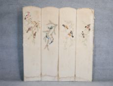 A hand embroidered fabric vintage four panel folding screen. Decorated with various species of