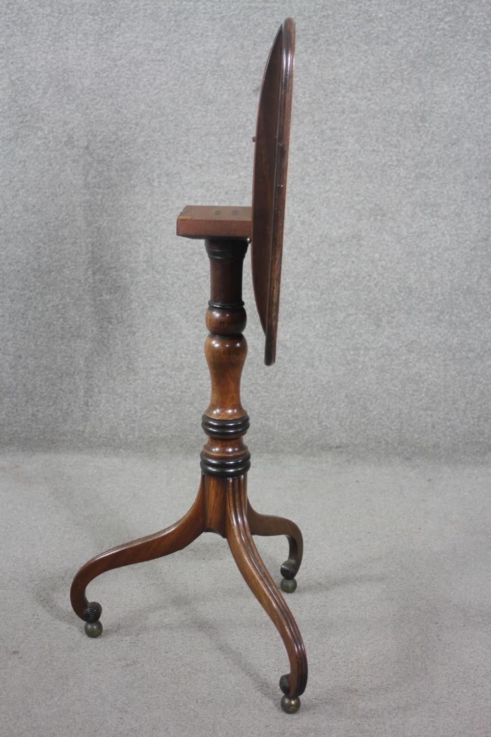 A 19th century mahogany tilt top table on turned column and tripod scrolling supports resting on - Image 8 of 8