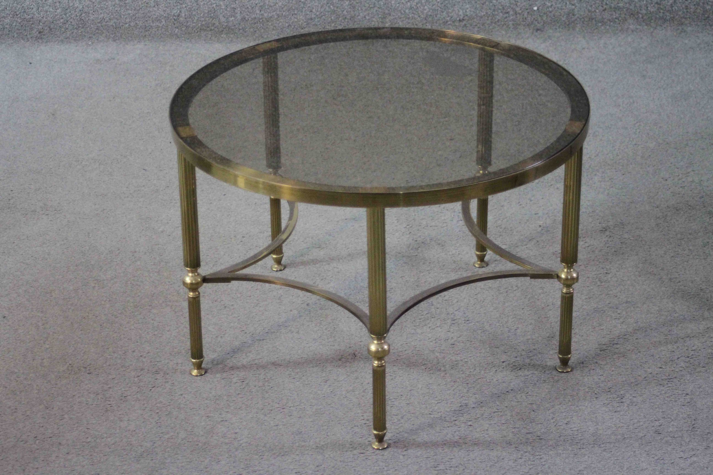 A mid century vintage smoked glass and brass lamp table on shaped stretchered supports. H.40 Diam. - Image 3 of 4