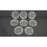 A set of eight hand painted Camelia engraving plates by Johnson Brothers. Makers mark to the back.