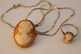A 9 carat yellow gold set carved shell cameo brooch and ring. The carved cameo brooch with pierced