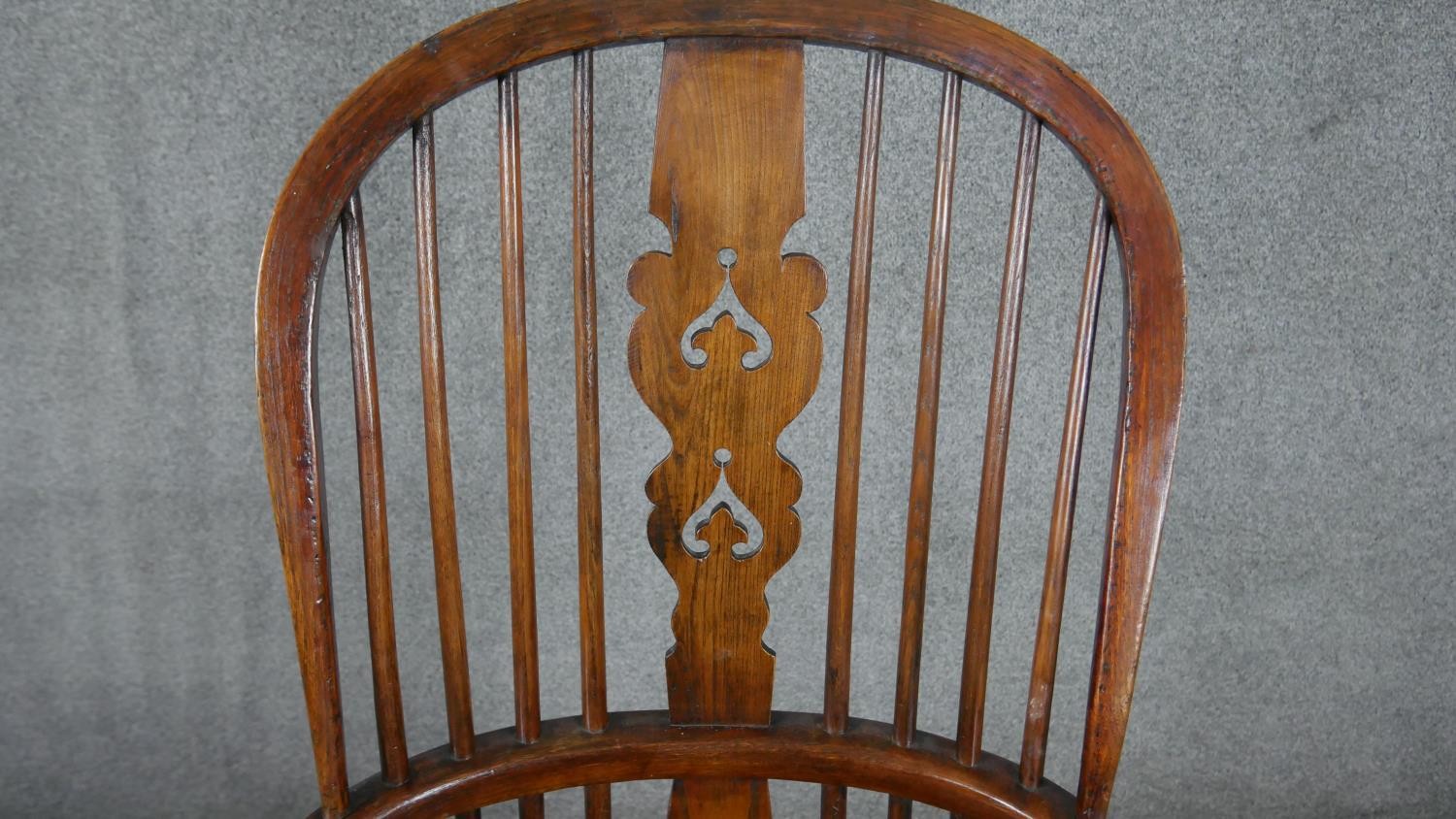 A 19th century elm Windsor armchair with pierced and carved central splat on turned and - Image 4 of 6