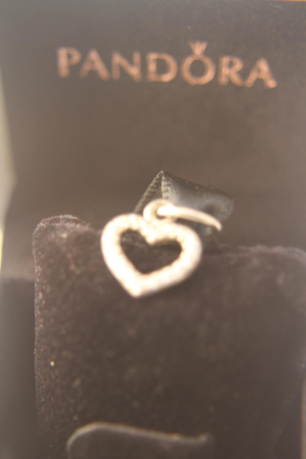 A collection of jewellery. Including a boxed Pandora stone set heart charm, a black opal doublet - Image 5 of 10