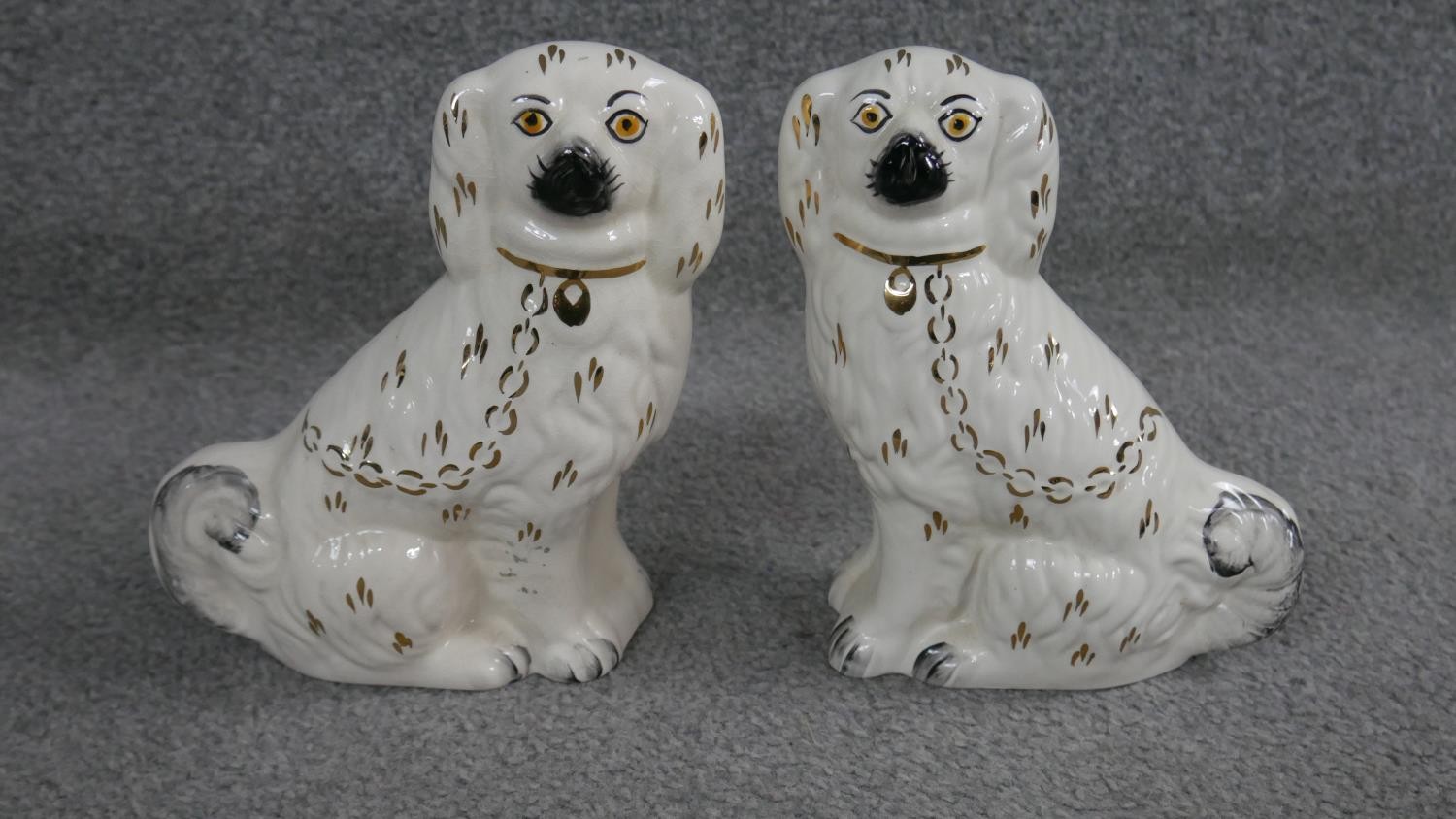 Two pairs of Staffordshire style ceramic spaniels. One pair with Blakeney stamp to bases. H.21 W. - Image 4 of 6