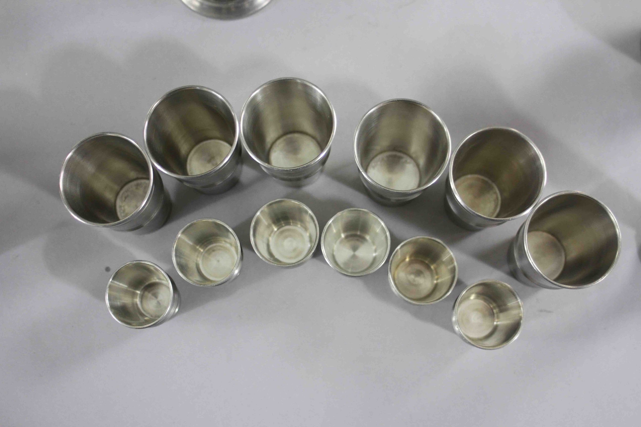 A large collection of pewter. Including a set of twelve Finish shot glasses, two different sizes - Image 6 of 8