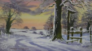 Terry Harrison- A framed and glazed watercolour of a snowy countryside landscape. Signed by