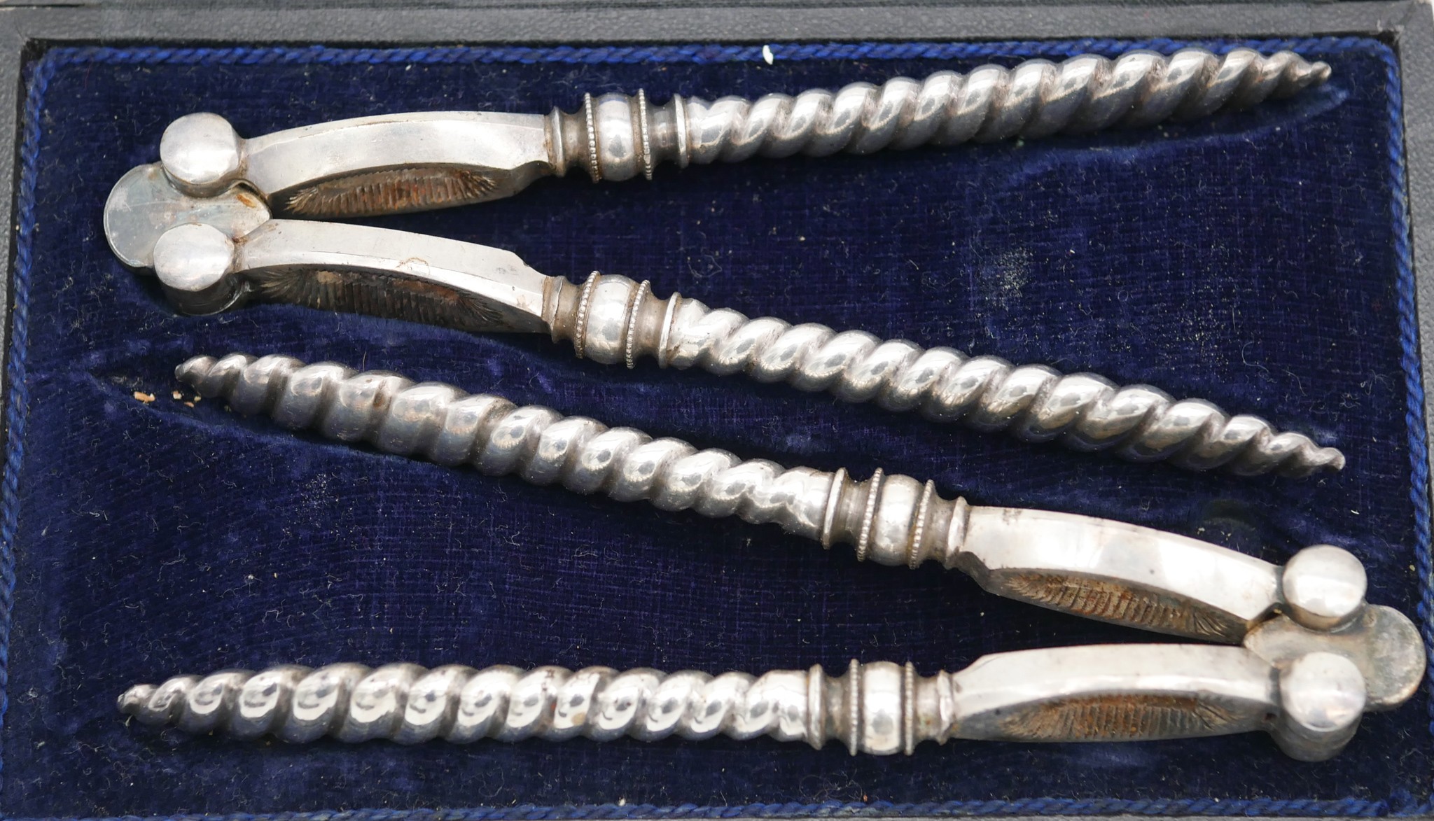 A leather cased set of Mappin and Webb silver plated fruit knives, a leather cased pair of silver - Image 7 of 10