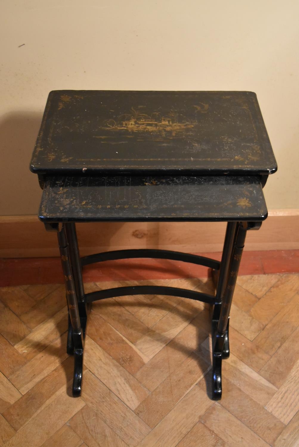 A nest of two hand decorated and black lacquered occasional table in the Chinoiseries style. H. - Image 3 of 7