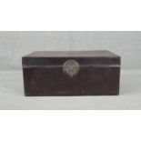 A Chinese leather wedding box with fabric interior and brass fittings. H.36t W.76 D.48cm