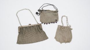 A collection of silver and silver plated vintage mesh evening bags. Including a rectangular silver