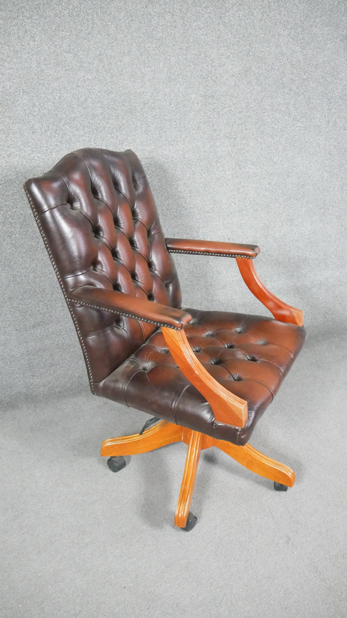 A Georgian style office armchair in deep buttoned leather upholstery with tilt and swivel action. - Image 3 of 7