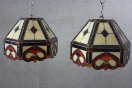 Two Tiffany style Art Nouveau influenced lead coloured stained glass ceiling lamp shades. Each