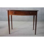 A 19th century mahogany and satinwood strung bow fronted side table on square tapering supports. H.