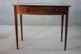 A 19th century mahogany and satinwood strung bow fronted side table on square tapering supports. H.