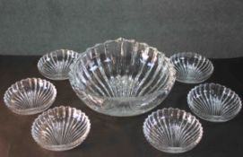 A Villeroy & Bosch large heavy crystal Lillian stylised shell bowl along with six matching dishes.