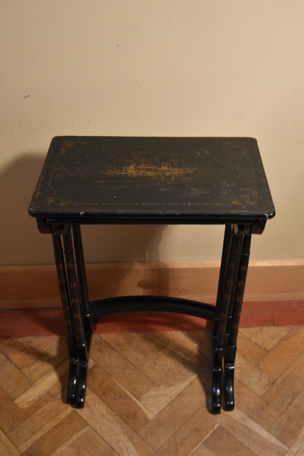 A nest of two hand decorated and black lacquered occasional table in the Chinoiseries style. H. - Image 2 of 7