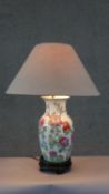 A vintage hand painted ceramic Chinese vase design table lamp. Decorated with Chinese lucky bats and