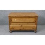 A 19th century style pine mule chest. H.69 W.93 D.50cm