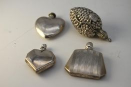 Four perfume bottles. A Danish silver heart shaped scent bottle with engraved design, stamped C.