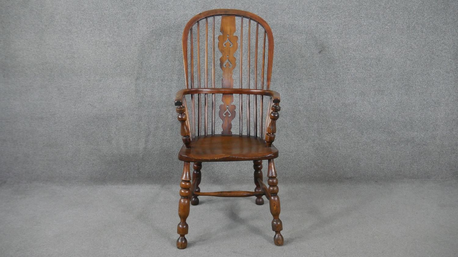 A 19th century elm Windsor armchair with pierced and carved central splat on turned and - Image 2 of 6