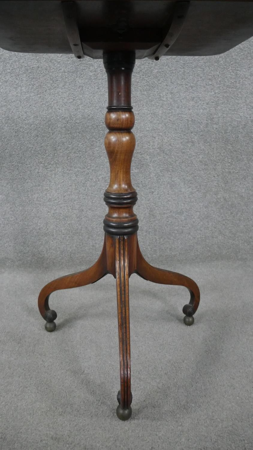 A 19th century mahogany tilt top table on turned column and tripod scrolling supports resting on - Image 5 of 8