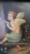 A 19th century carved gilt framed oil on board of a winged putti sitting in a wood with flowers.