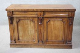 A mid 19th century mahogany sideboard fitted with a pair of drawers and doors on plinth base. H.90