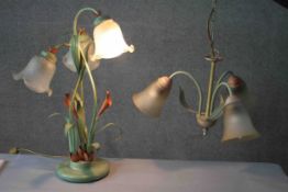 A toleware painted floral design table lamp along with a similar three branch chandelier. The