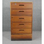 A mid century vintage teak pedestal filing chest of five drawers on plinth base. H.92 W.51 D.51cm