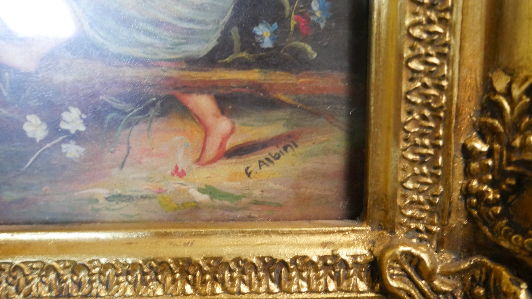 A 19th century carved gilt framed oil on board of a winged putti sitting in a wood with flowers. - Image 5 of 5