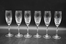 A set of six 20th century cut crystal champagne flutes. H.23 Dia.6cm