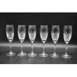 A set of six 20th century cut crystal champagne flutes. H.23 Dia.6cm