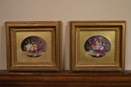 A pair of early 20th century framed oils on board, one depicting still life fruit and the other