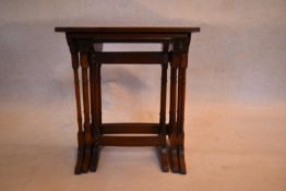 A 19th century style mahogany nest of three graduating occasional tables. H.56 W.50 D.36cm (largest)