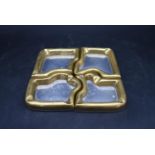 David Marshall - A set of four contemporary aluminium coasters with brass surround, handcrafted in a