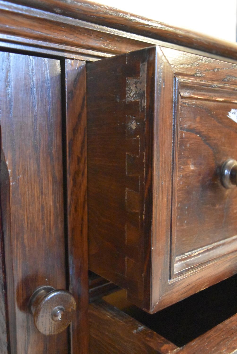 A mid century country antique style oak sideboard with a central bank of drawers flanked by linen - Image 7 of 11