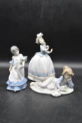 Three 20th century Lladro figures with makers marks to base. H.23 W.15cm (tallest) (3)