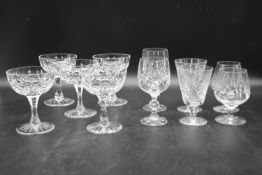 A set of 20th century cut crystal glasses. To include, five champagne coupes and three